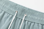 AMIRI Starburst logo shell swim shorts